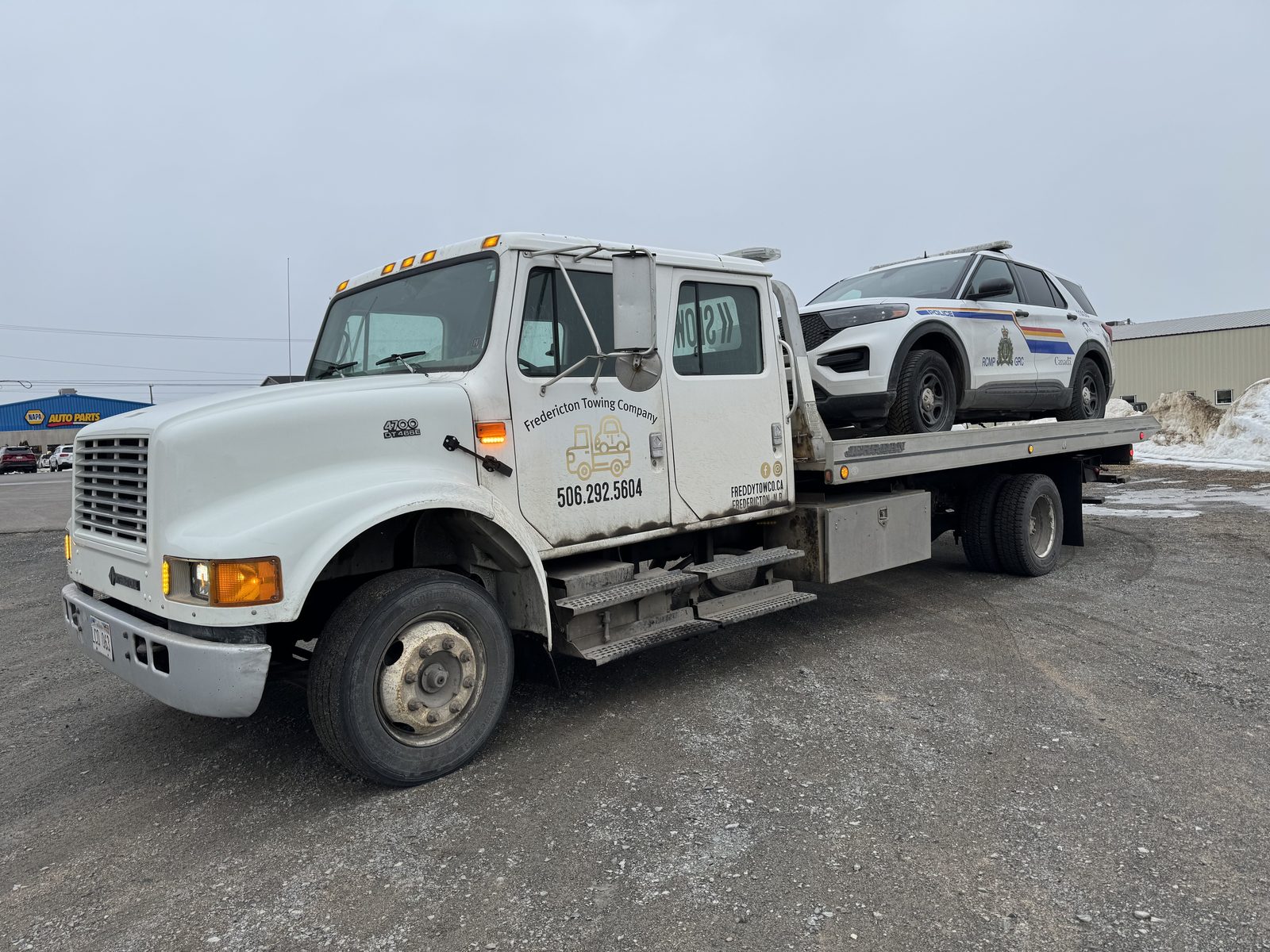 Freddy Tow Co. flatbed responding at an RCMP-coordinated accident scene in Fredericton, NB.